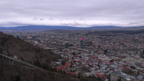 aerial view of tbilisi city buildings from mtatsminda park in georgia. - pullback shot
