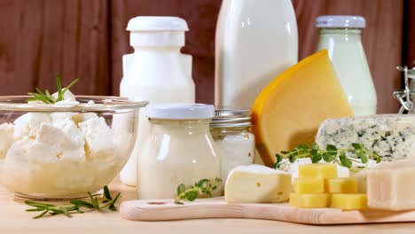 assorted dairy items displayed on wooden surface