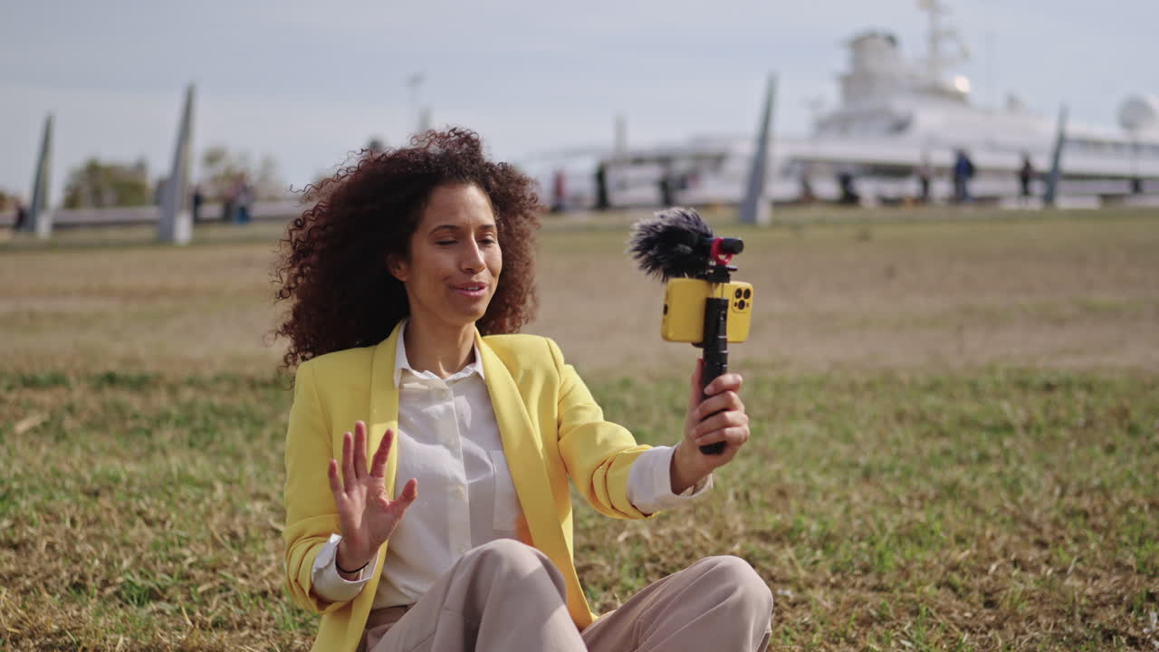 Woman vlogging outdoors