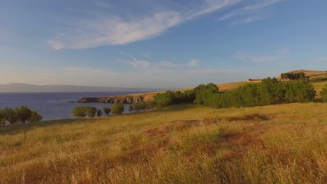 Aerial:-Sunset-at-the-cliffs-of-Molyvos,-Lesbos