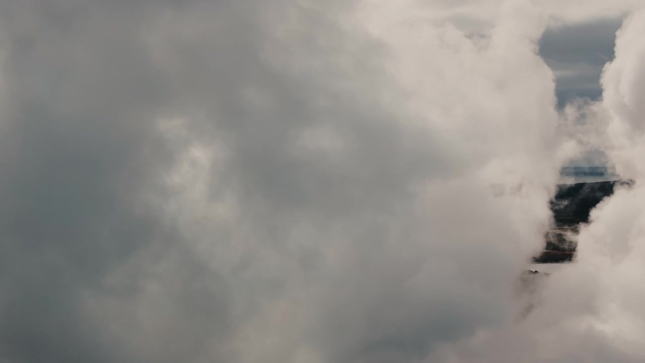 Aerial Drone Immersed in Dense Geothermal Vapor Column Iceland