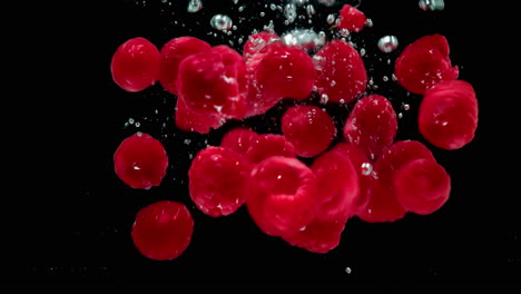 raspberries in splash