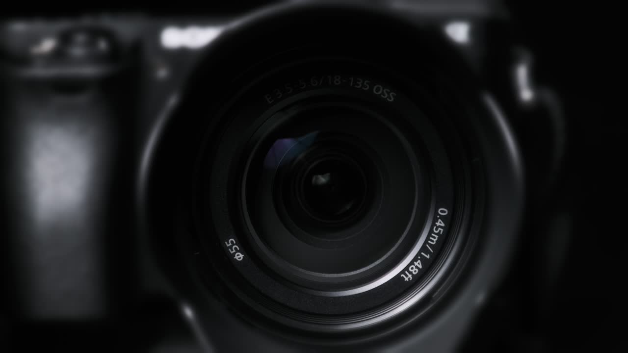The Camera Lens Rotates, Lights Reflecting Off Glass, Robotic Camera Movement