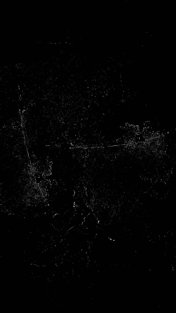 Abstract White Dust Particles Moving on Black Background