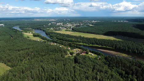 forestry landscape and city of druskininkai in horizon, high angle drone view