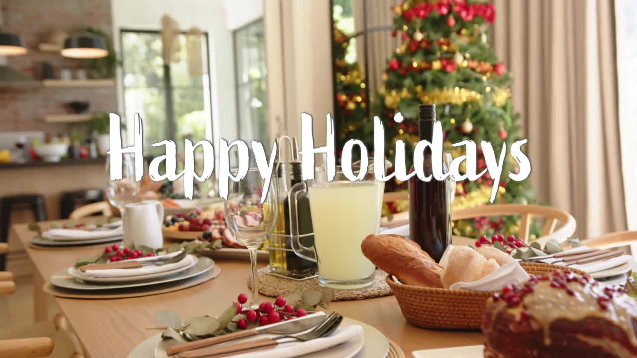 크리스마스에서 음식과 함께 테이블 위에 행복한 휴일 텍스트의 애니메이션