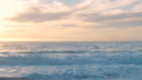 fast, fit and active woman running by the ocean