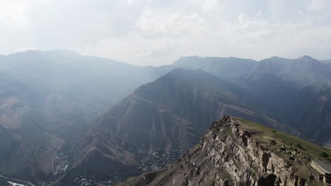 mountainous landscape with valley and villages