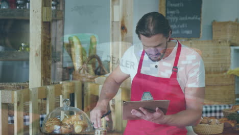 animación de gráficos financieros sobre vendedor masculino caucásico en una panadería