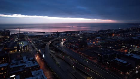 rising-aerial-of-millwaukee,-wisconsin,-USA-night-time-close-to-sunrise