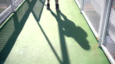 sportswoman warming up during cardio training on bridge