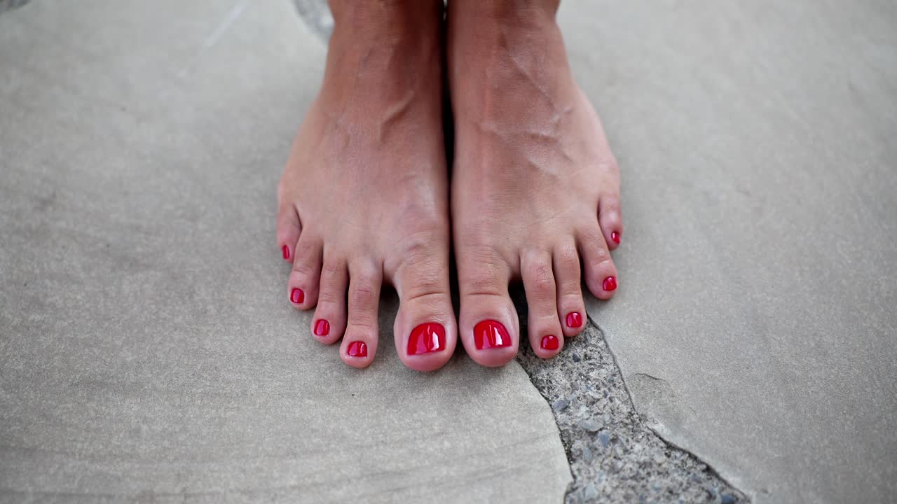Close up of Feet with Red Nail Polish