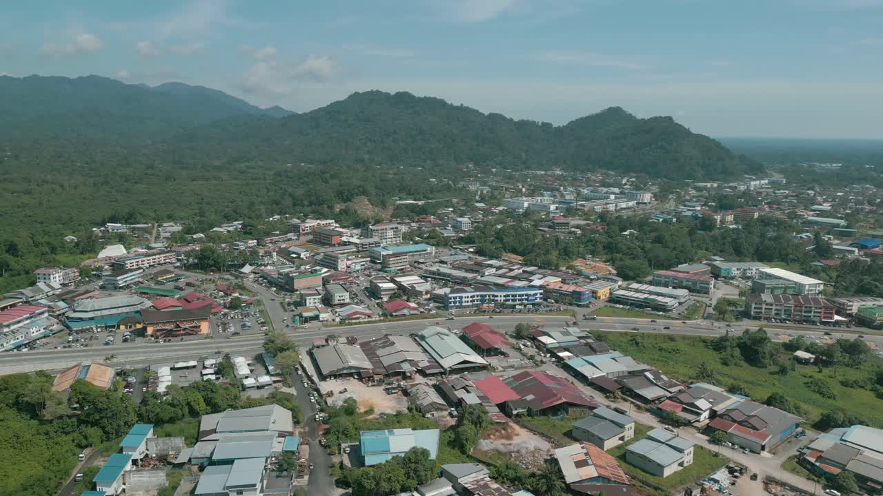 Aerial Drone View, Serian District Town ,Summer With Beautiful Green Trees,New Building And Water Park Lake, Water From The Mountain Sarawak,Borneo.