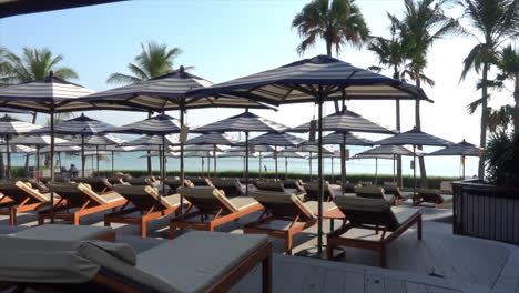 bed pool with umbrella around swimming pool in hotel resort for vacation concept-6