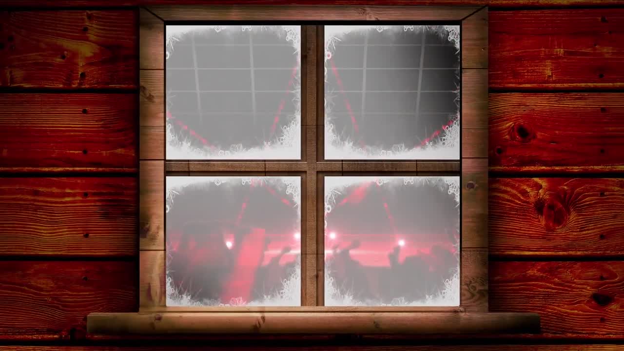 Wooden window frame against red disco lights over silhouette of people dancing