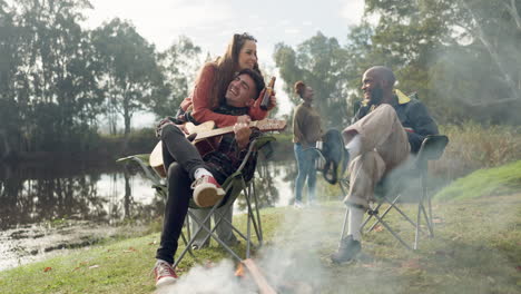 friends, campfire and guitar with music