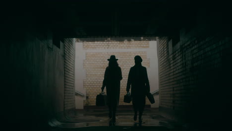 two women in a tunnel walking