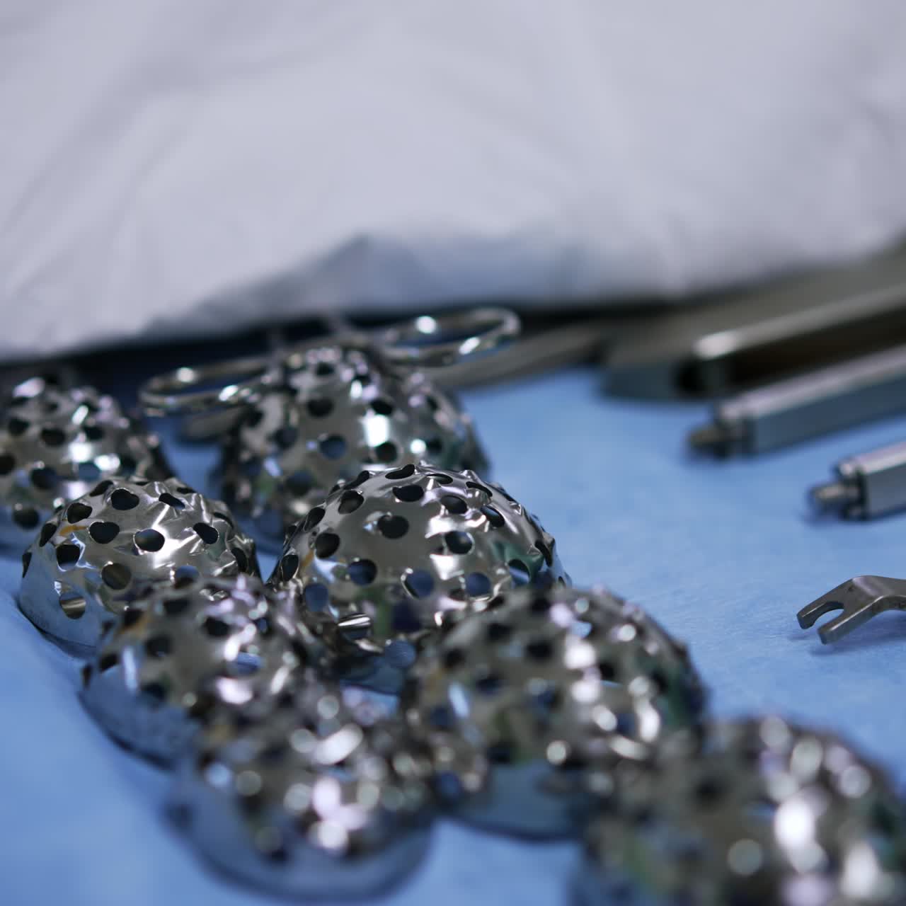 Materials and medical instruments on the table. Tools for arthroscopic surgery, close up