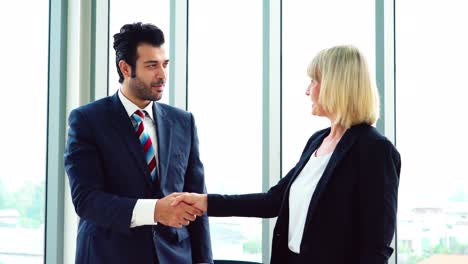 business people handshake with friend at office