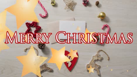 Feliz-Navidad-Texto-Banner-E-Iconos-De-Estrellas-Contra-Elementos-Decorativos-De-Navidad-En-La-Superficie-De-Madera