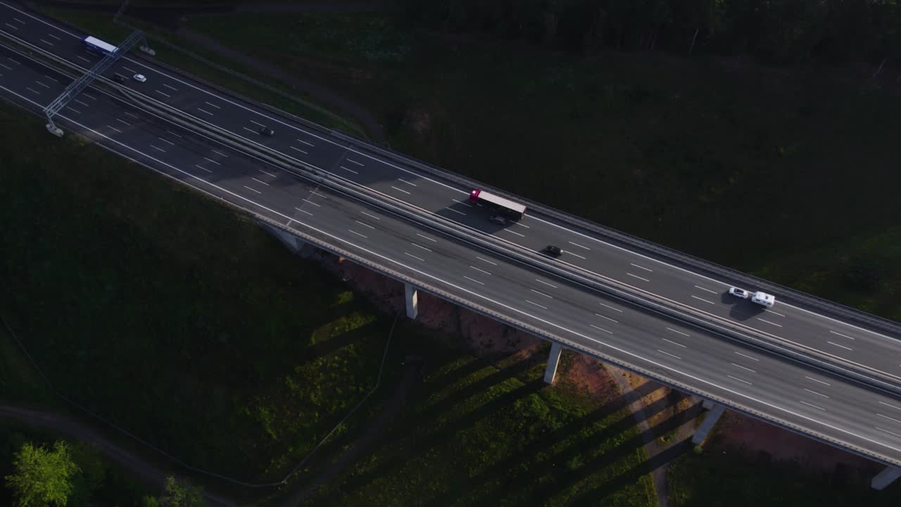 Aerial View of Highway Traffic on a Bridge