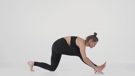 woman doing a side stretch yoga pose