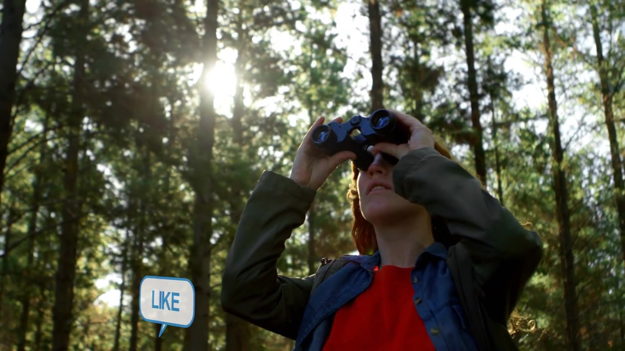 Woman raising binoculars and scanning sky in forest, speech bubbles growing while tracking birds
