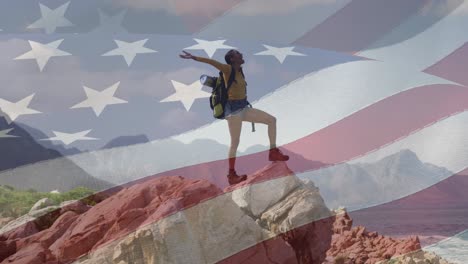 animation der amerikanischen flagge, die sich über eine frau bewegt, die ihre arme am strand ausbreitet