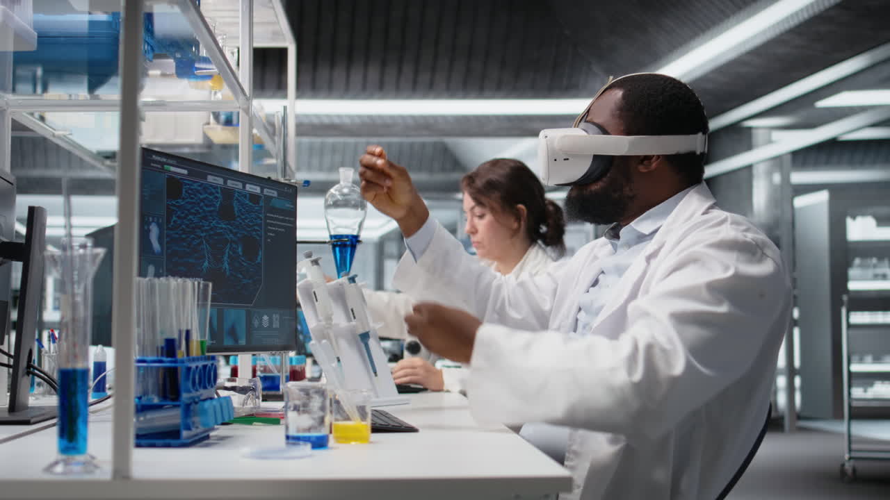 Vertical video Scientist using computer and VR headset equipment for DNA data analysis