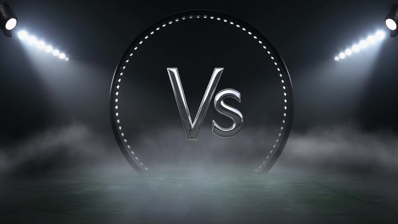 Versus Versus -logon paljastus lavalla sumun ja kohdevalojen kera
