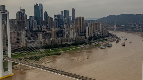 timelapse of the amazing chongqing cyberpunk city skyline from a high vantage point wirh the yangtze river