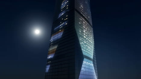 modern skyscraper at night with moon