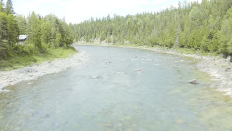 drone flying up river