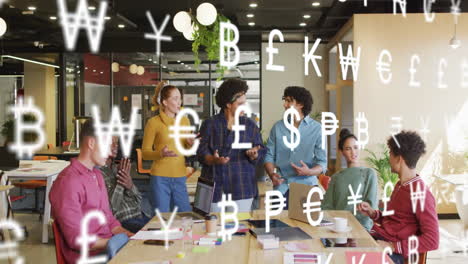 team members gesturing around wooden table, discussing finance with floating currency symbols
