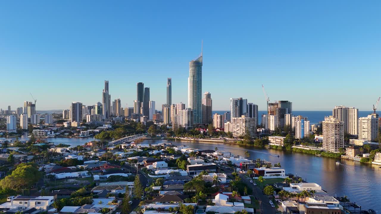 Drone captures Gold Coast's skyline and Nerang River in a dynamic hyperlapse, showcasing vibrant city life and natural beauty