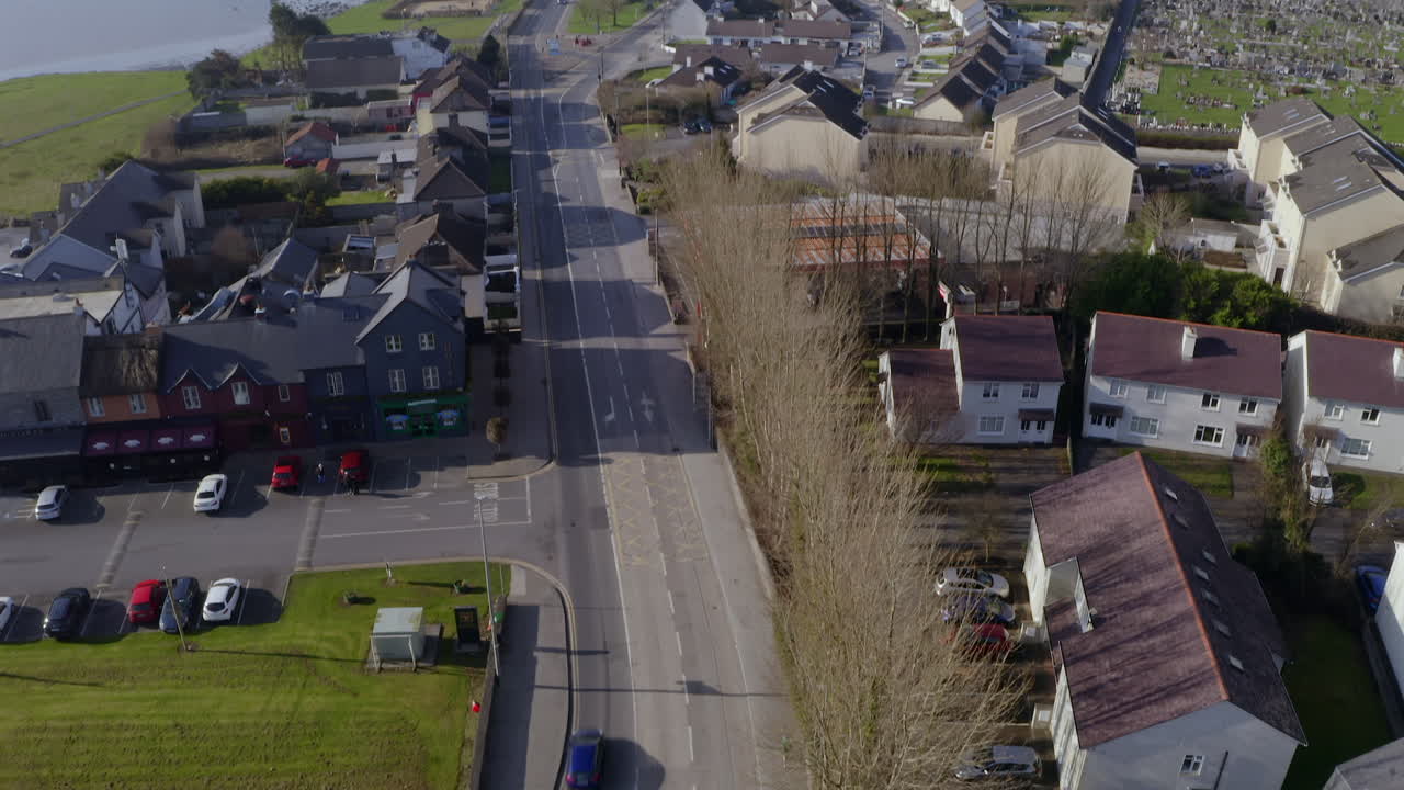Galway's Arterial Pulse: Vibrant Junction Revealed from Above as Morning Light Bathes Urban Landscape