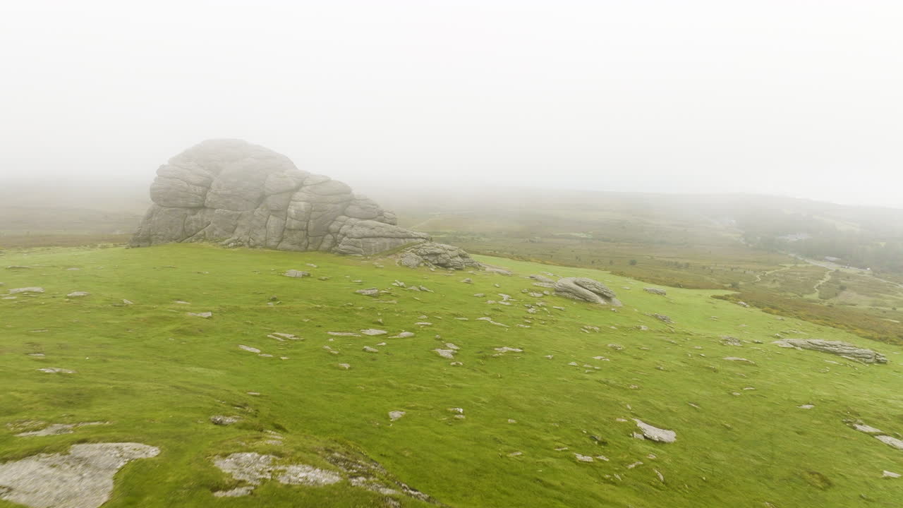 Misty Dartmoor Landscape with Rocks