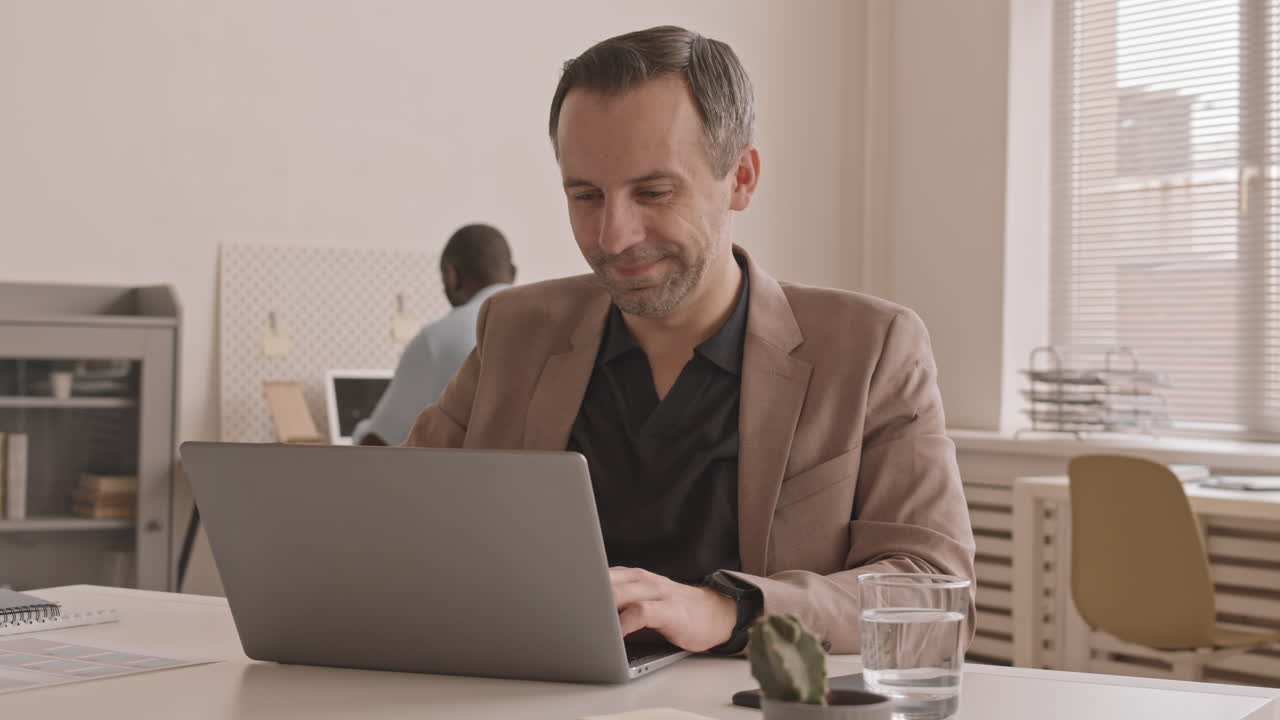 Man Happy about Work Results