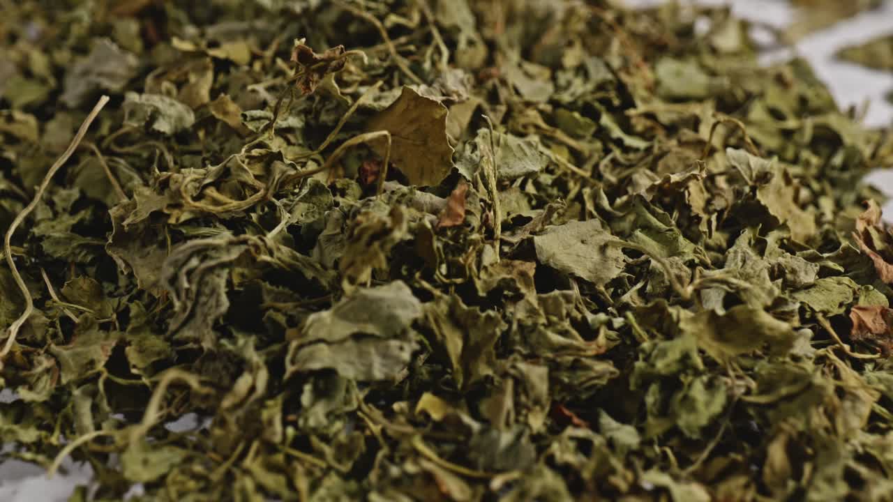 dried fenugreek leaves or Kasuri methi close up, parallax shot, 4k