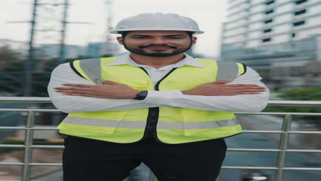 confident engineer in safety vest