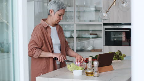 woman preparing a salad