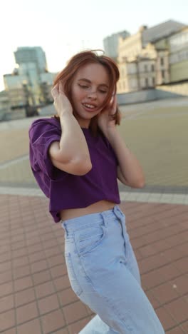 woman enjoying music outdoors