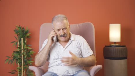 Old-man-getting-bad-news-on-the-phone-gets-upset.