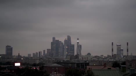 moscow cityscape at dusk/dawn under cloudy skies