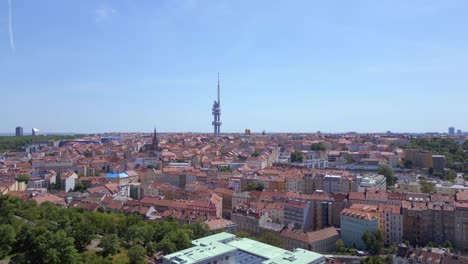 Perfect-aerial-top-view-flight-tower-in-prague-downtown-city-czech-republic-in-Europe,-summer-of-2023