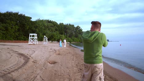 Love-story-photo-shooting.-Photographer-taking-picture-of-love-couple