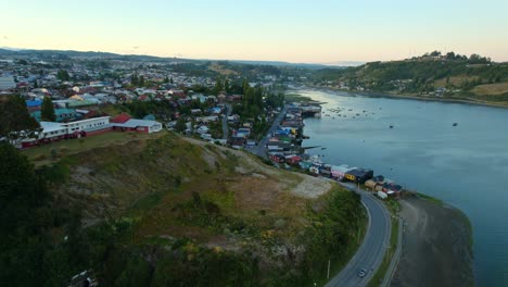 Aerial-Panoramic-Sunrise-Landscape,-Castro-Chiloé,-Patagonian-Island-Sea-Village