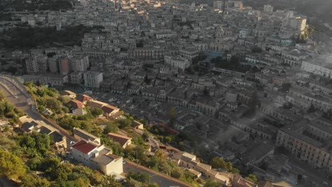 beautiful city modica at sicily during sunrise, aerial