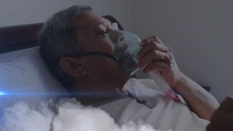 animation of light trails and smoke over senior biracial man using oxygen mask