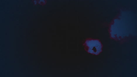 Mesmerizing-blue-circle-envelopes-floating-red-center